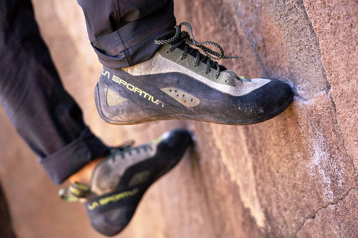 Moderate climbing shoes on a crack climb, combining comfort and grip for trad routes.