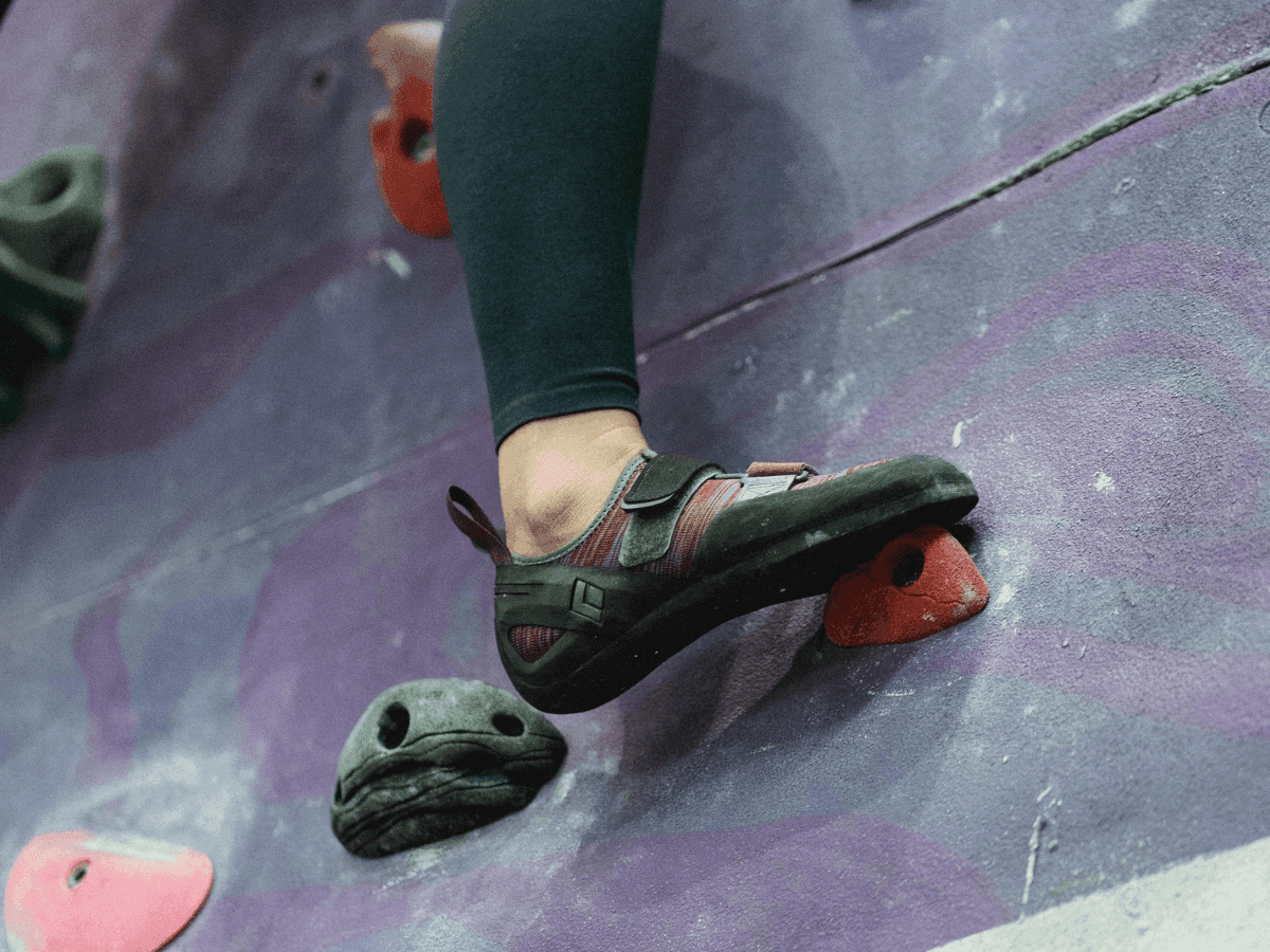 Neutral climbing shoes on a slab route, great for beginners and easy climbs.